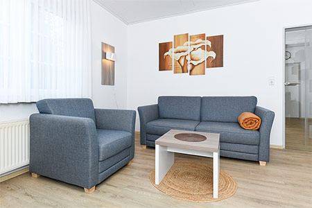 Ferienwohnung „Wellenreiter“ - Wohnzimmer