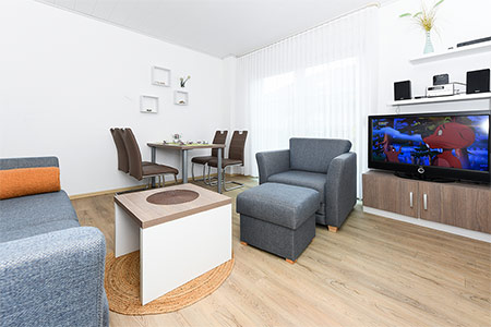 Ferienwohnung „Wellenreiter“ - Wohnzimmer