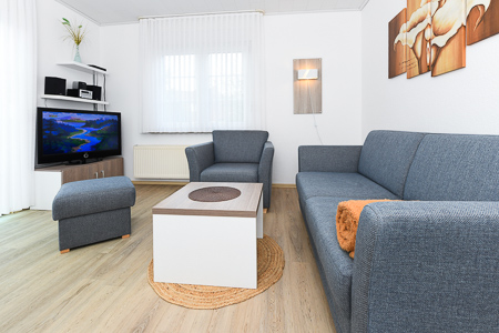 Ferienwohnung „Wellenreiter“ - Wohnzimmer
