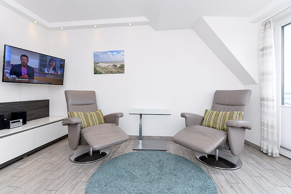 Ferienwohnung „Seebrise“ - Wohnzimmer mit integriertem Küchenbereich