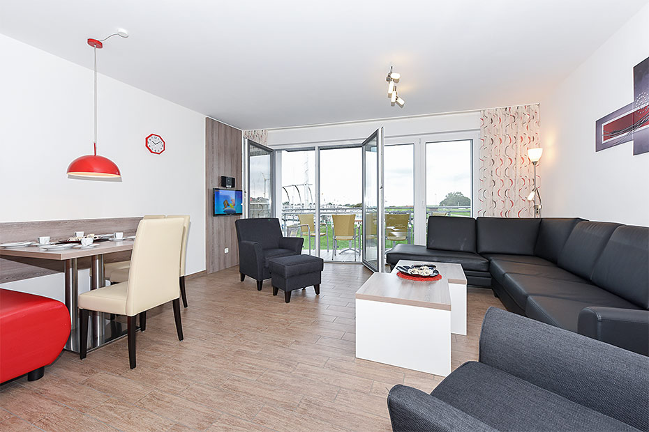 Ferienwohnung „Seewind“ - Wohnzimmer mit integriertem Küchenbereich