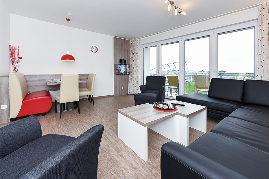 Ferienwohnung „Seewind“ - Wohnzimmer mit integriertem Küchenbereich