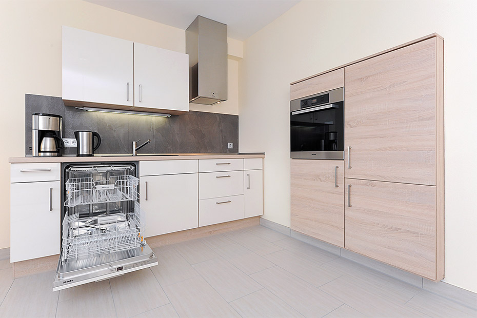 Ferienwohnung „Strandidyll“ - Wohnzimmer mit integriertem Küchenbereich