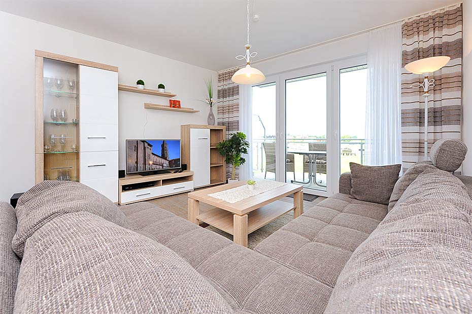 Ferienwohnung „Windrose“ - Wohnzimmer mit integriertem Küchenbereich