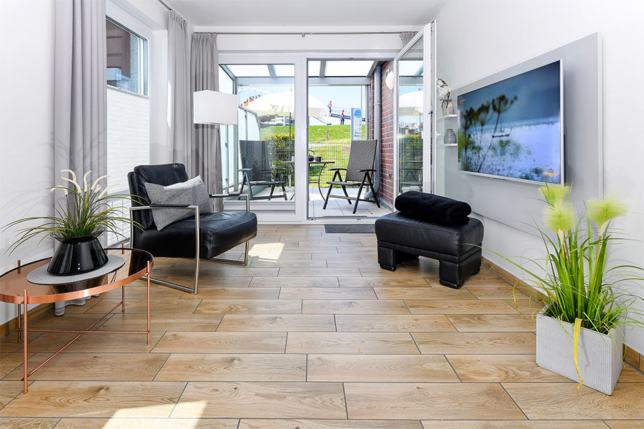 Ferienwohnung „Buhne 5“ - Wohnzimmer mit integriertem Küchenbereich