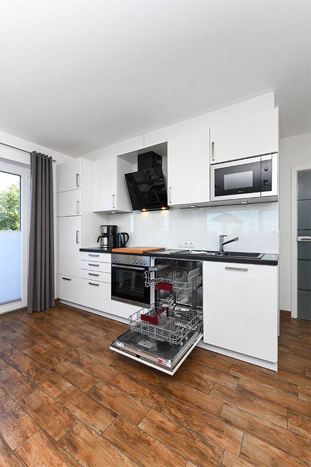 Ferienwohnung „Buhne 6“ - Wohnzimmer mit integriertem Küchenbereich