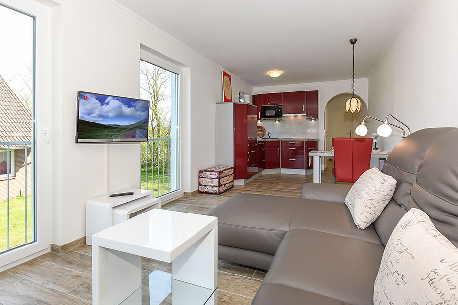 Ferienwohnung 1 - Wohnzimmer mit integriertem Küchenbereich