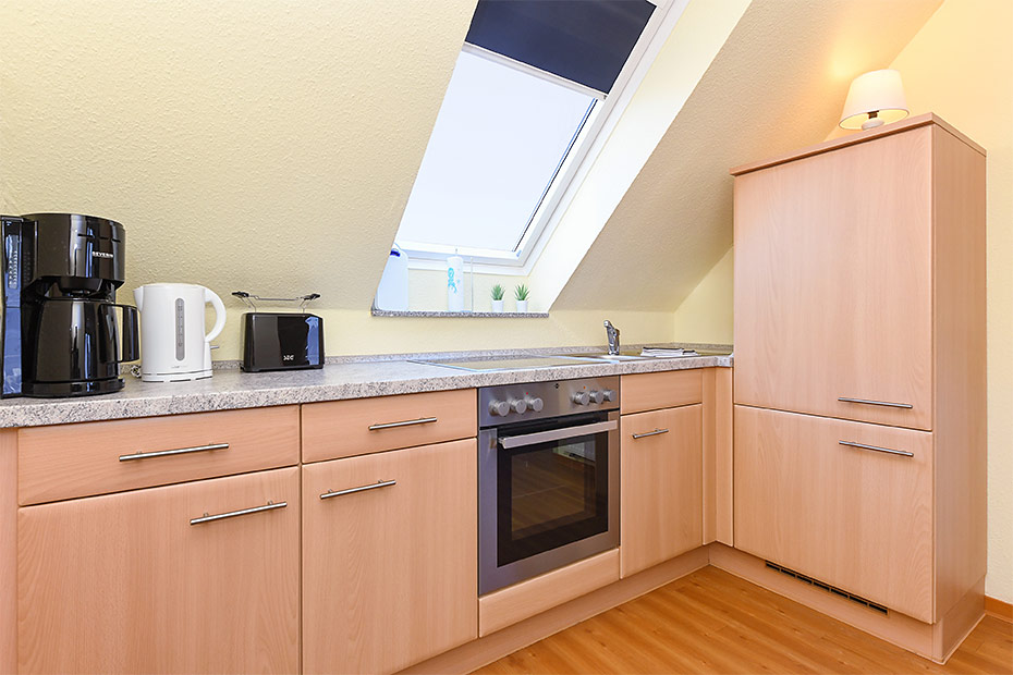 Ferienwohnung „Flut“ - Wohnraum mit integrierter Küche