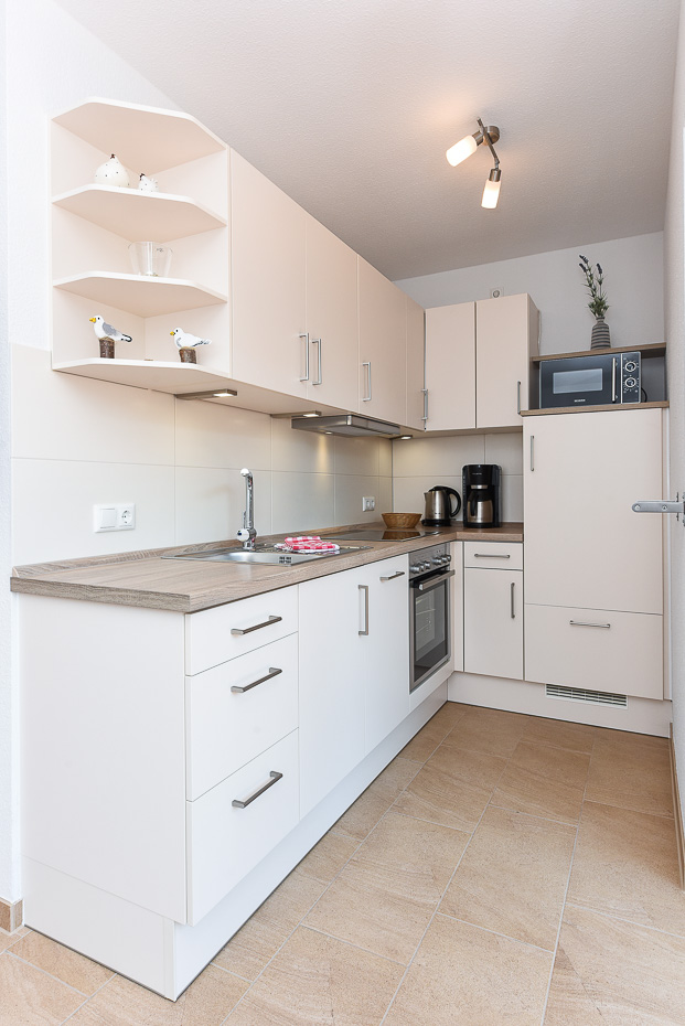 Ferienwohnung „Seeperle“ - Wohnzimmer mit integriertem Küchenbereich