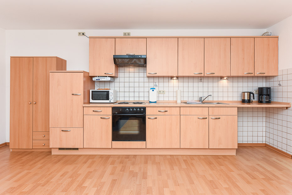 Ferienwohnung 2 - Wohnzimmer mit integriertem Küchenbereich