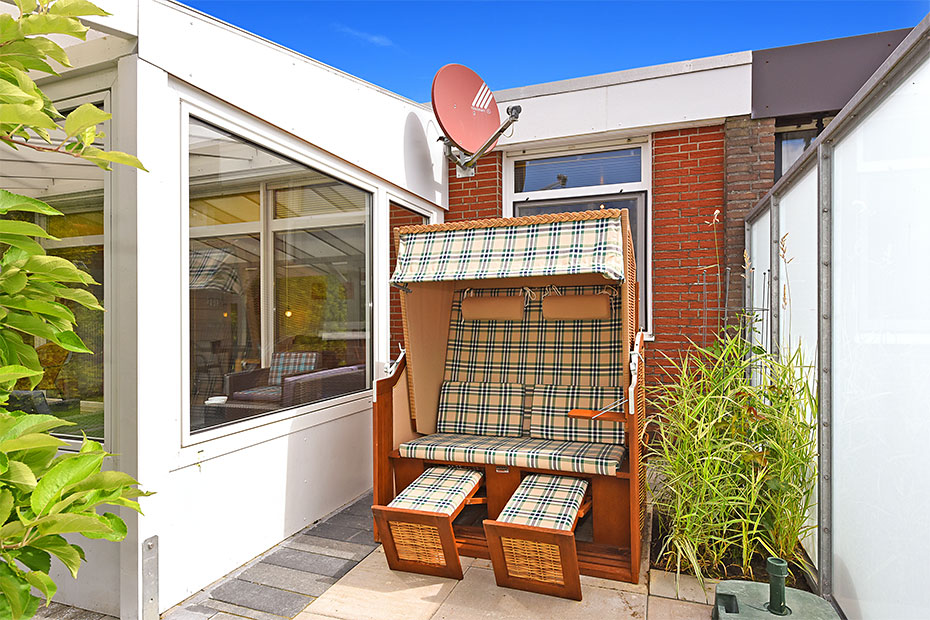 Ferienhaus „Sonnenstern“ - Garten mit Grill und Strandkorb