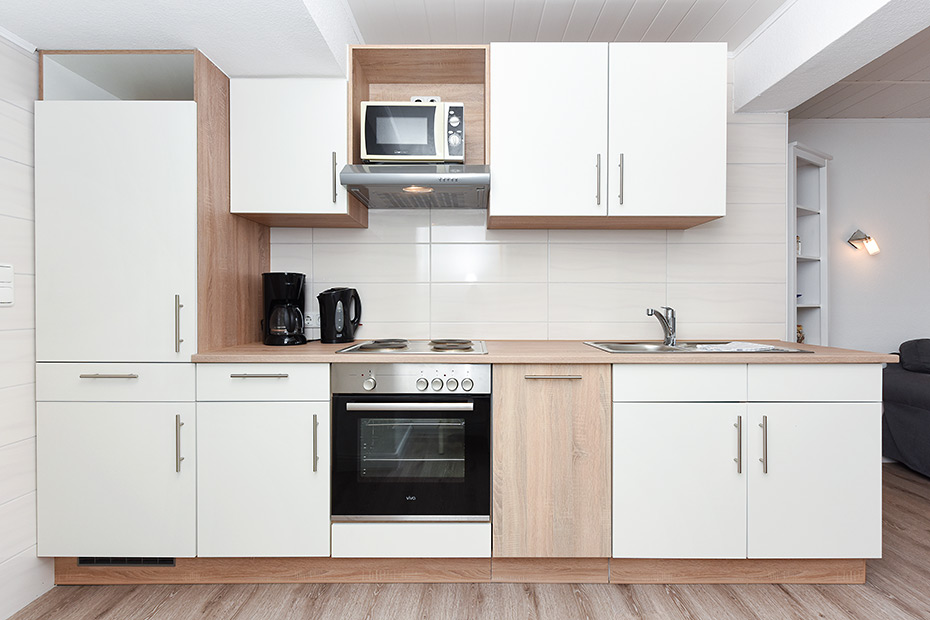 Ferienwohnung 5 - Wohnzimmer mit integriertem Küchenbereich