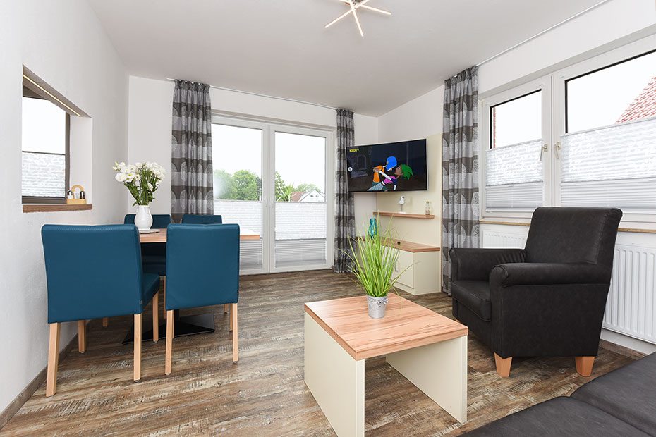 Ferienwohnung „Möwe 1“ - Wohnzimmer mit Schlafcouch