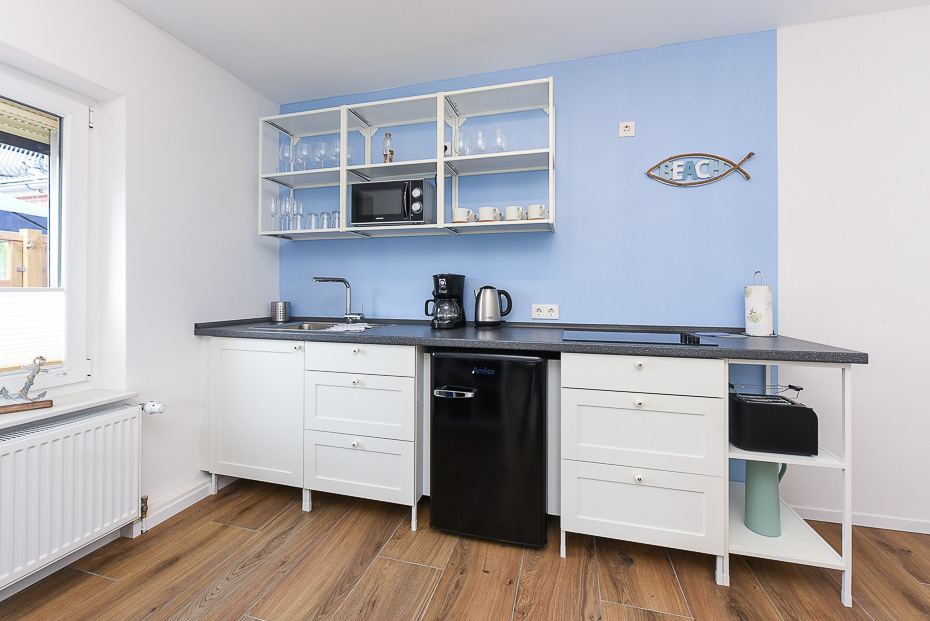 Ferienwohnung 5 - Wohnzimmer mit integriertem Küchenbereich