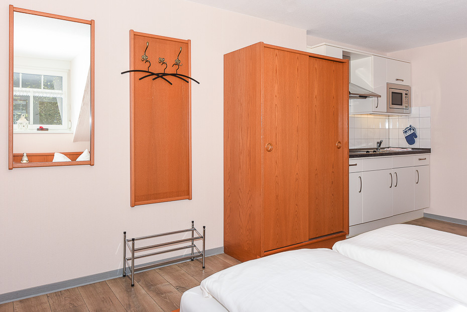 Apartment 18 - Wohn- und Schlafraum mit integriertem Küchenbereich