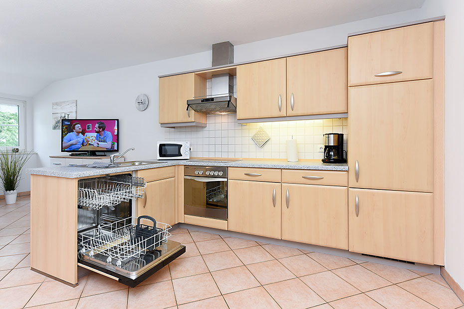 Ferienwohnung „Westen“ - Wohnzimmer mit integriertem Küchenbereich