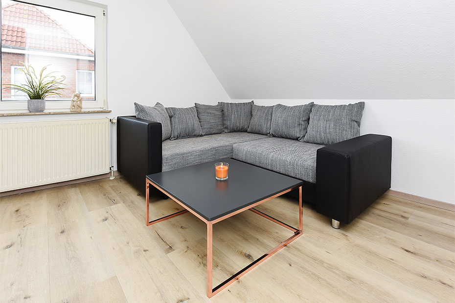 Ferienwohnung 2 - Wohnzimmer mit integriertem Küchenbereich