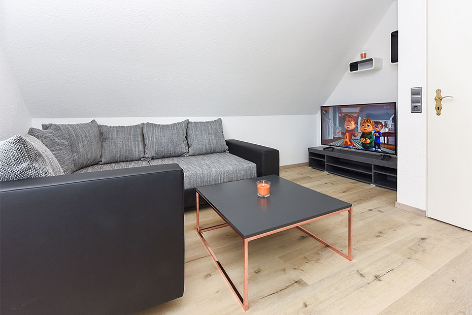 Ferienwohnung 2 - Wohnzimmer mit integriertem Küchenbereich