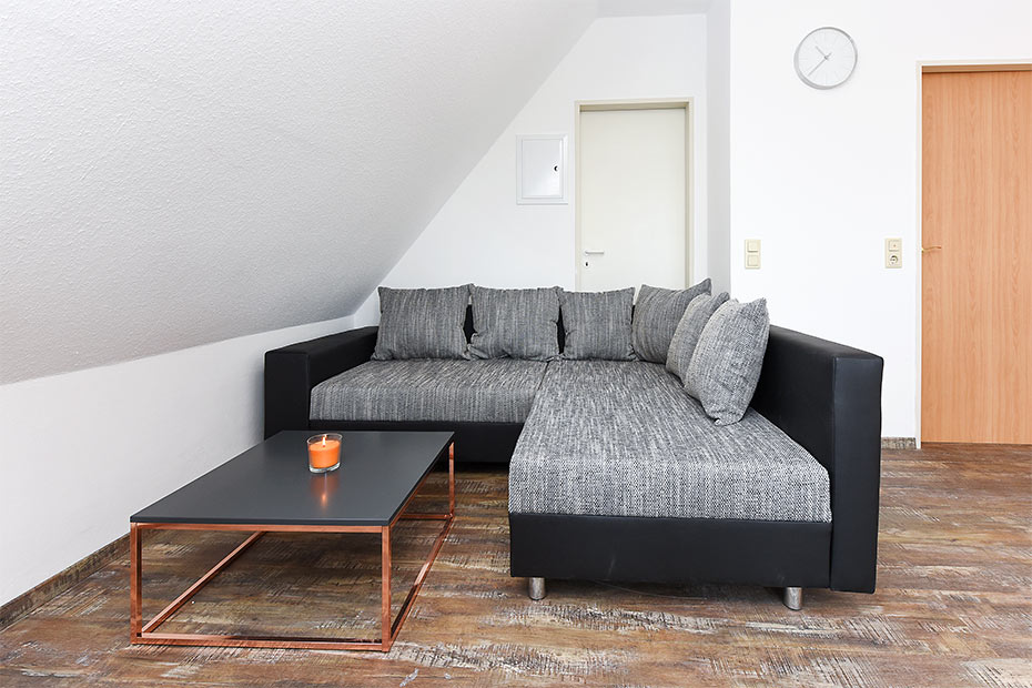 Ferienwohnung 3 - Wohnzimmer mit integriertem Küchenbereich