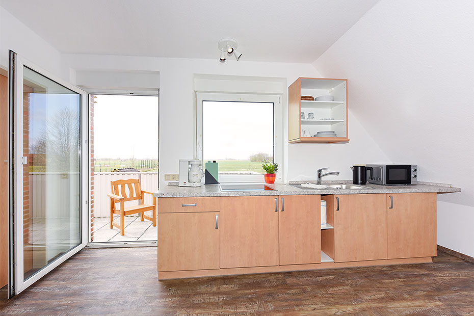 Ferienwohnung 3 - Wohnzimmer mit integriertem Küchenbereich