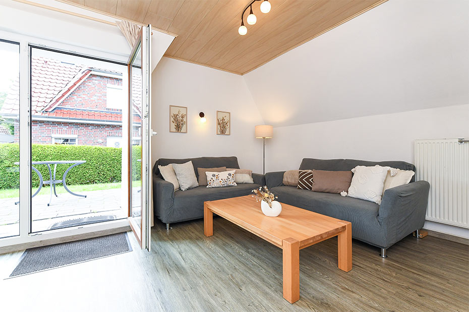 Ferienhaus „NordseeNest“ - Wohnzimmer mit Essbereich
