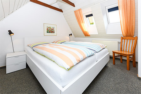 Ferienwohnung - Schlafzimmer