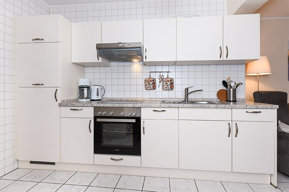 Ferienwohnung „Juist“ - Wohnzimmer mit integriertem Küchenbereich