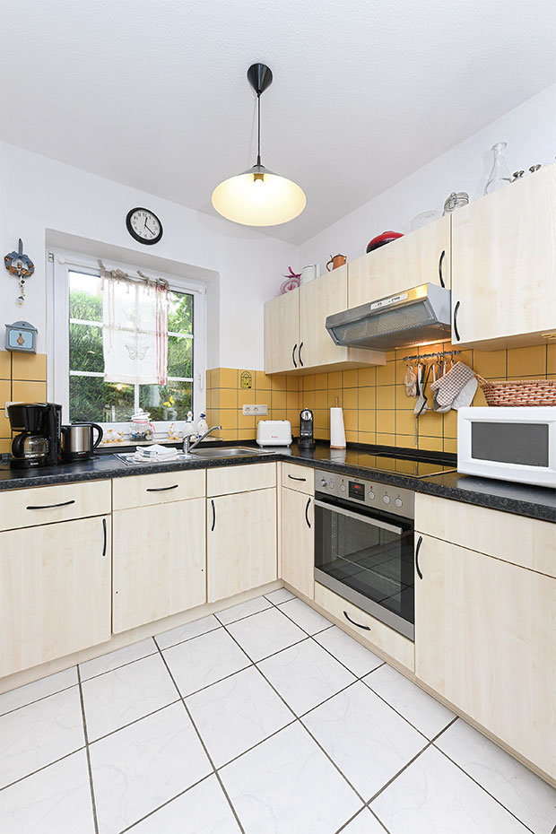 Ferienhaus „Dat Krebs Huus“ - Wohnzimmer mit integriertem Küchenbereich