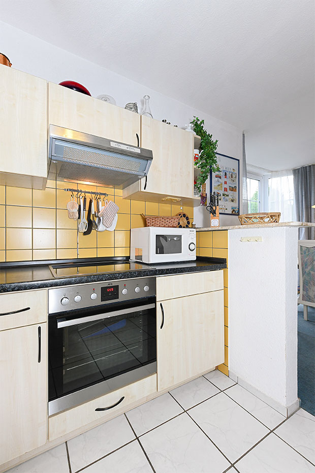 Ferienhaus „Dat Krebs Huus“ - Wohnzimmer mit integriertem Küchenbereich