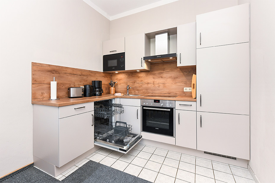 Ferienwohnung „Ost“ - Wohnzimmer mit integriertem Küchenbereich