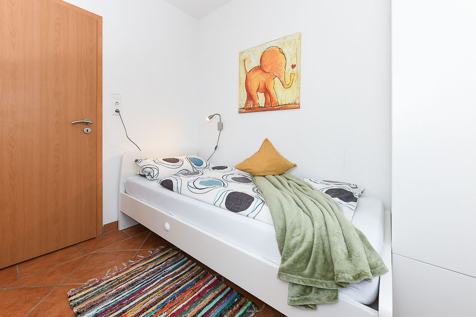 Ferienhaus „Am Deich“ - Schlafzimmer 2/Kinderzimmer