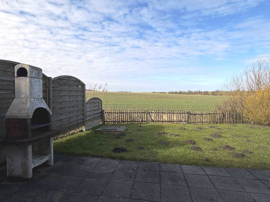 Ferienhaus „Merlins Zauberhaus“ - Terrasse und Garten