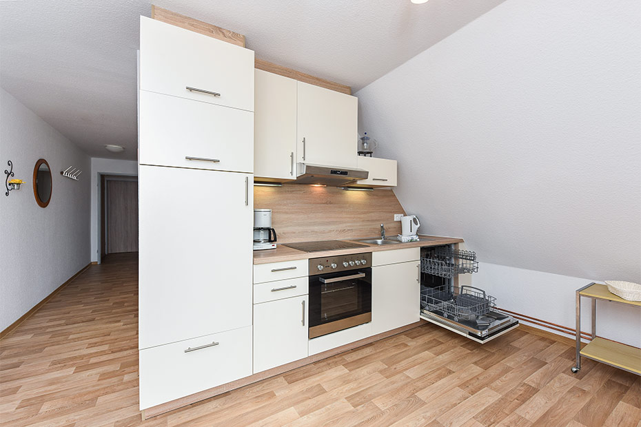 Ferienwohnung „Taubennest“ - Wohnzimmer mit integriertem Küchen- und Essbereich