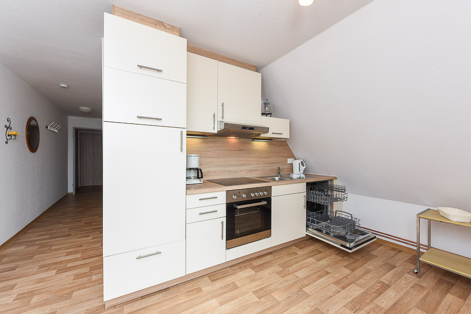 Ferienwohnung „Taubennest“ - Wohnzimmer mit integriertem Küchen- und Essbereich