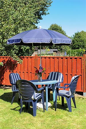 Ferienwohnung - Sitzgruppe im Garten