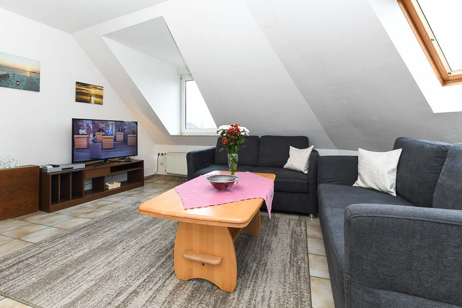 Ferienwohnung „Elly“ -  Wohnzimmer mit integrierter Küche