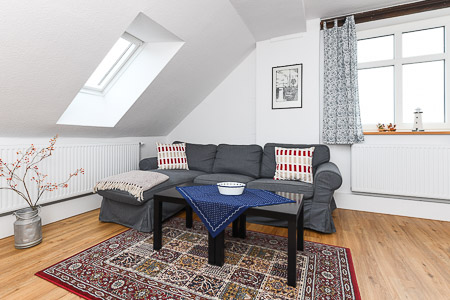 Ferienwohnung „Flut“ - Wohnzimmer mit Essbereich