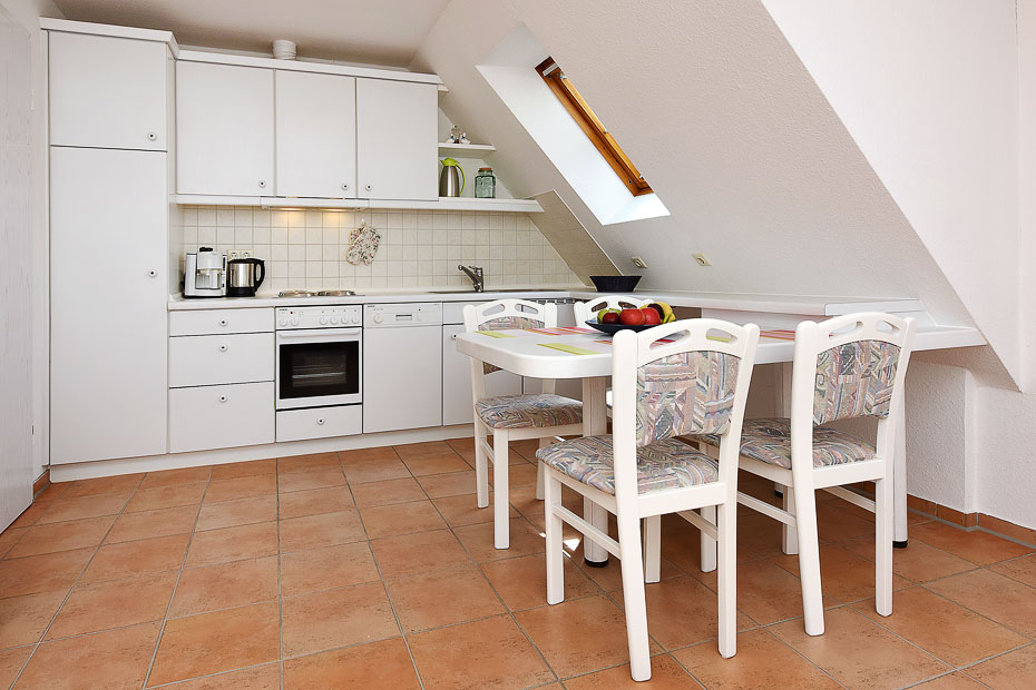 Ferienwohnung „Sonnendeck“ - Wohnzimmer mit integriertem Küchenbereich