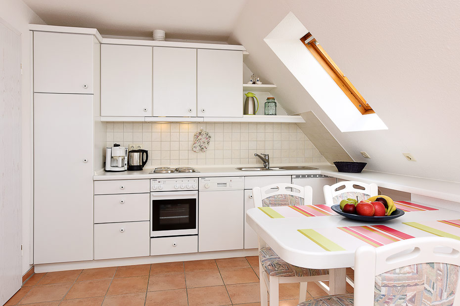 Ferienwohnung „Sonnendeck“ - Wohnzimmer mit integriertem Küchenbereich