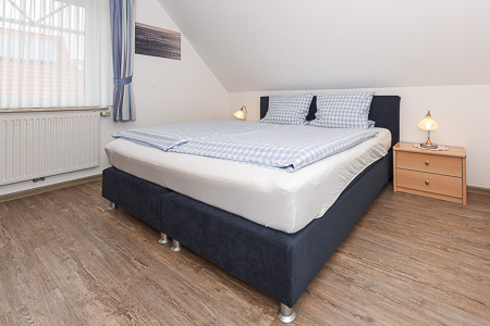 Ferienwohnung - Schlafzimmer