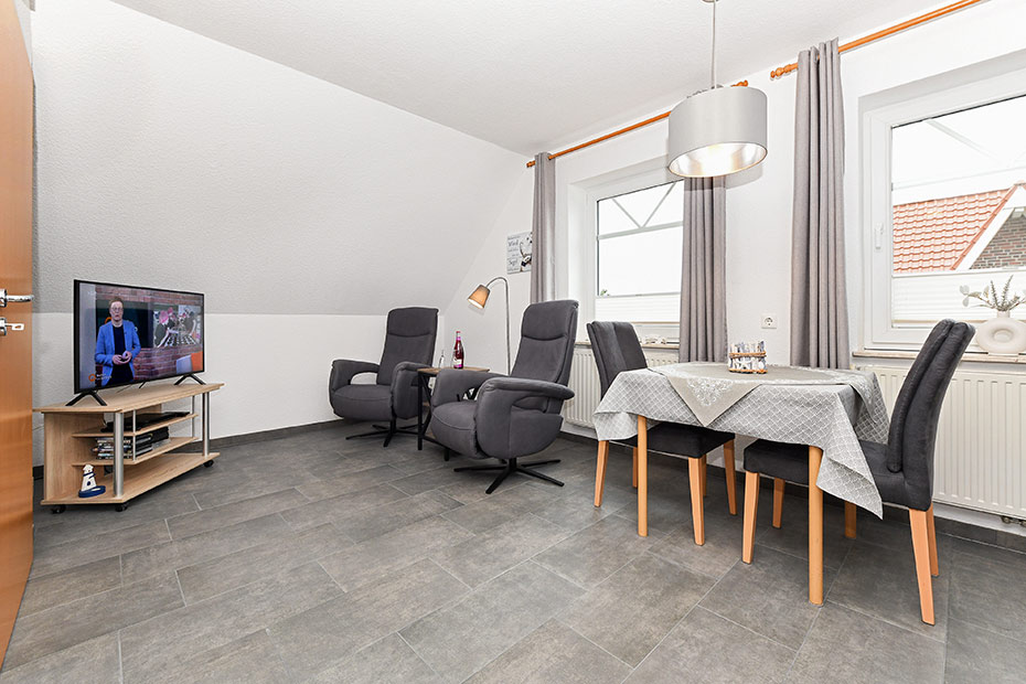 Ferienwohnung - Wohnzimmer mit integriertem Küchenbereich