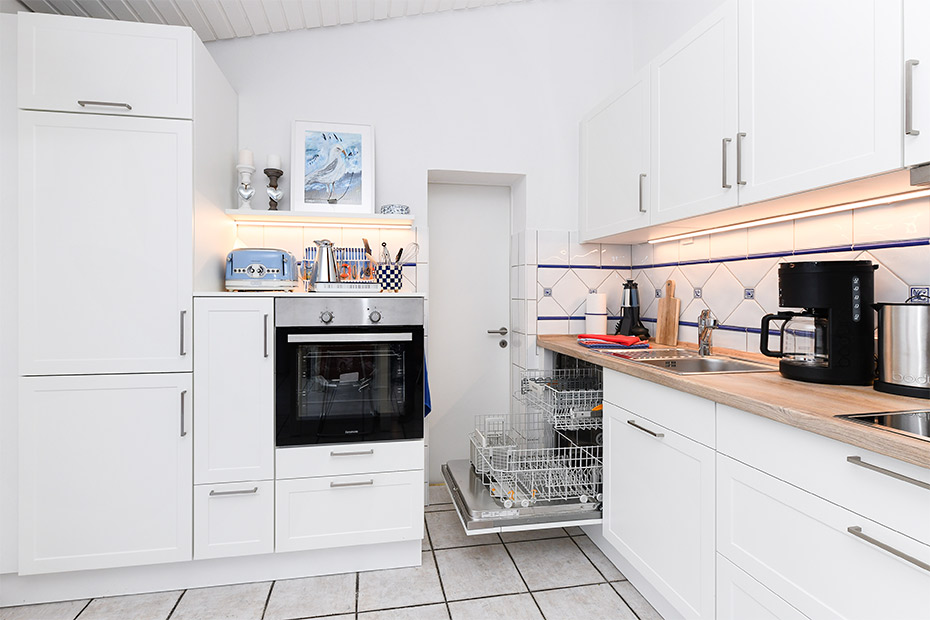 Ferienhaus „Auf Reede“ - Wohnzimmer mit integriertem Küchenbereich