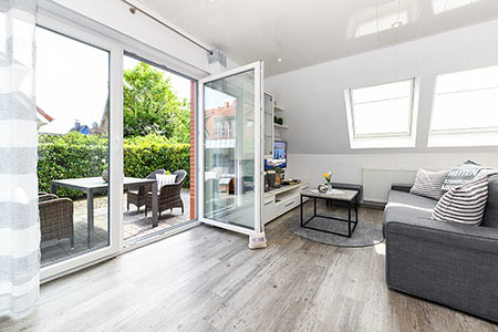 Ferienhaus Harle - Wohnzimmer mit integriertem Küchenbereich