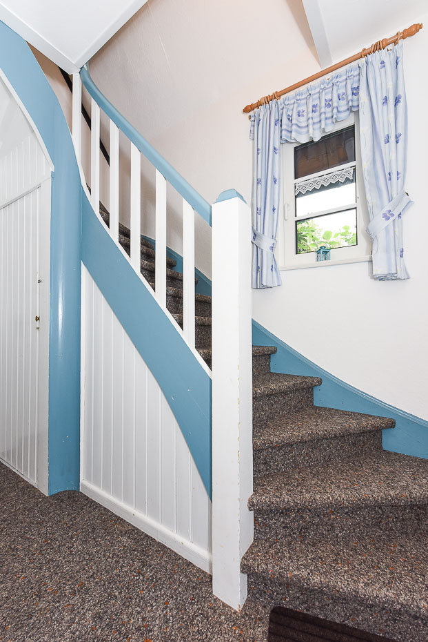 Ferienwohnung - Treppe ins Obergeschoss