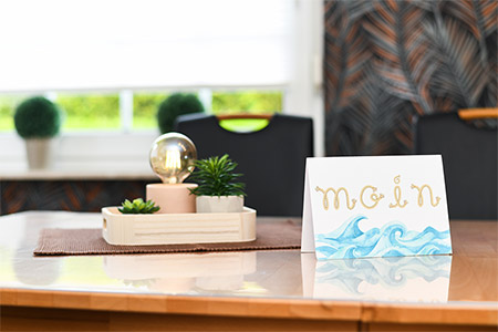 Ferienhaus „Moin“ - Wohnzimmer mit integriertem Küchenbereich