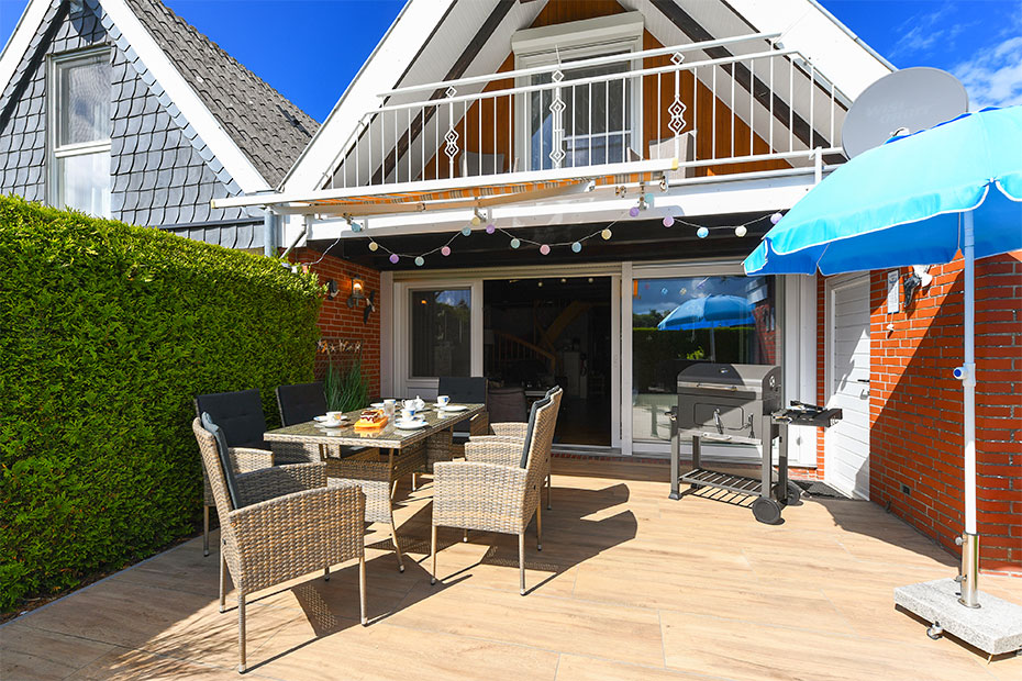Ferienhaus „Kleine Möwe“ - Terrasse und Garten