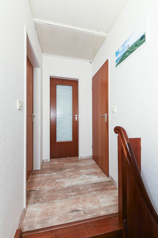 Ferienhaus „Schlatt“ - Treppenaufgang und Flur im Obergeschoss