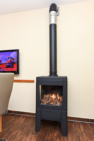 Ferienhaus „Schmidt-Rottluff“ - Wohnzimmer mit integriertem Küchenbereich