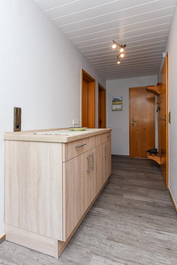 Ferienwohnung groß - Wohnzimmer mit integriertem Küchenbereich