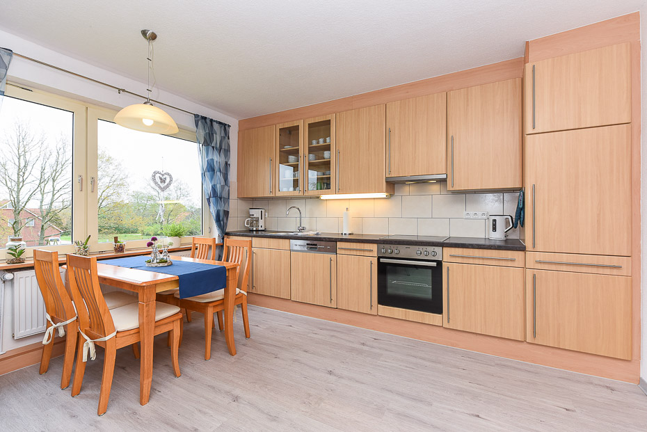 Ferienwohnung „Sternenlicht“ - Wohnzimmer mit integriertem Küchenbereich